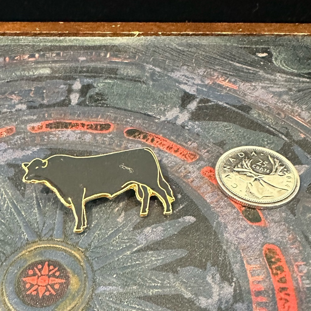 VINTAGE enamel and gold tone, metal black cow, pin/brooch